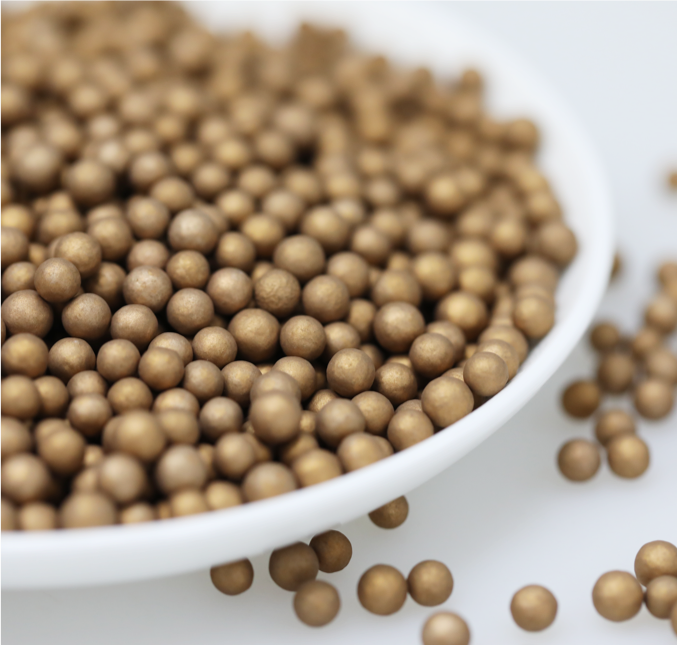 Close-up of Golden MACA-KDF Microporous Ceramic Balls